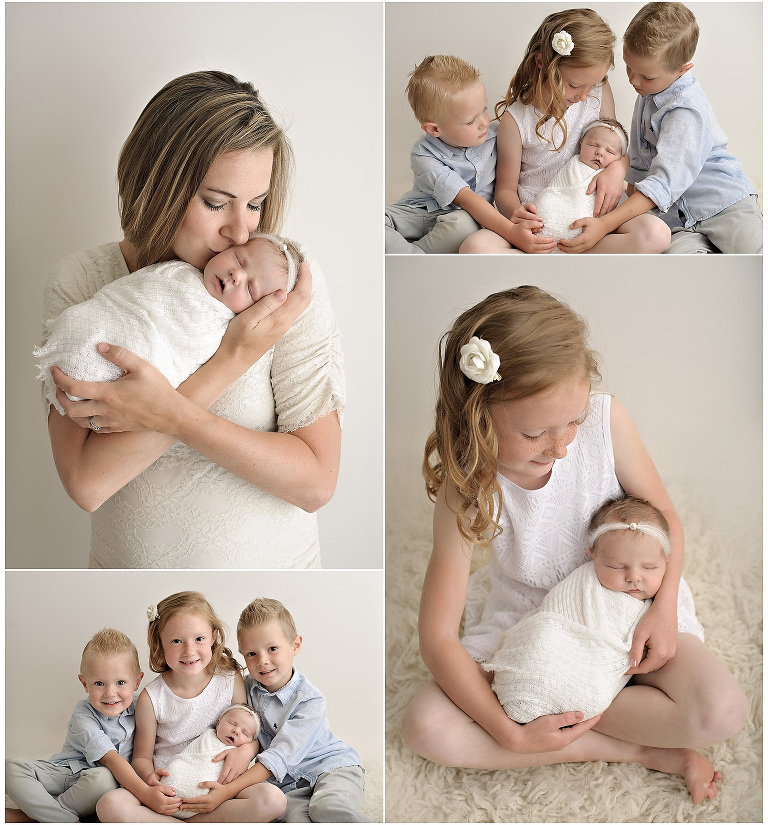Cream and blue outfits of newborn girl and her two brothers and sisters and mom