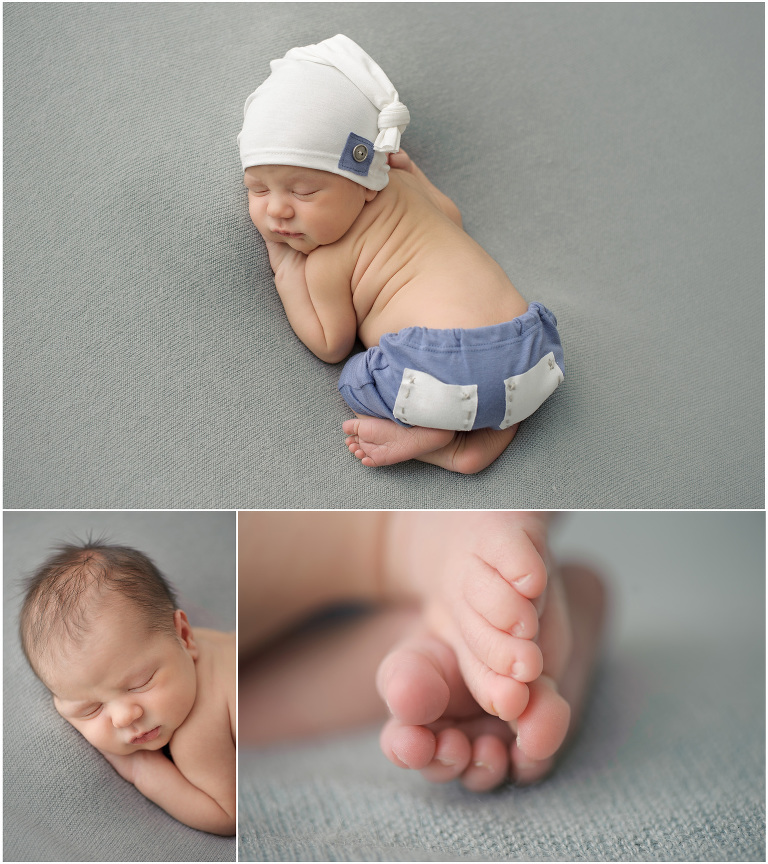 Chubby newborn boy with gray and blue props