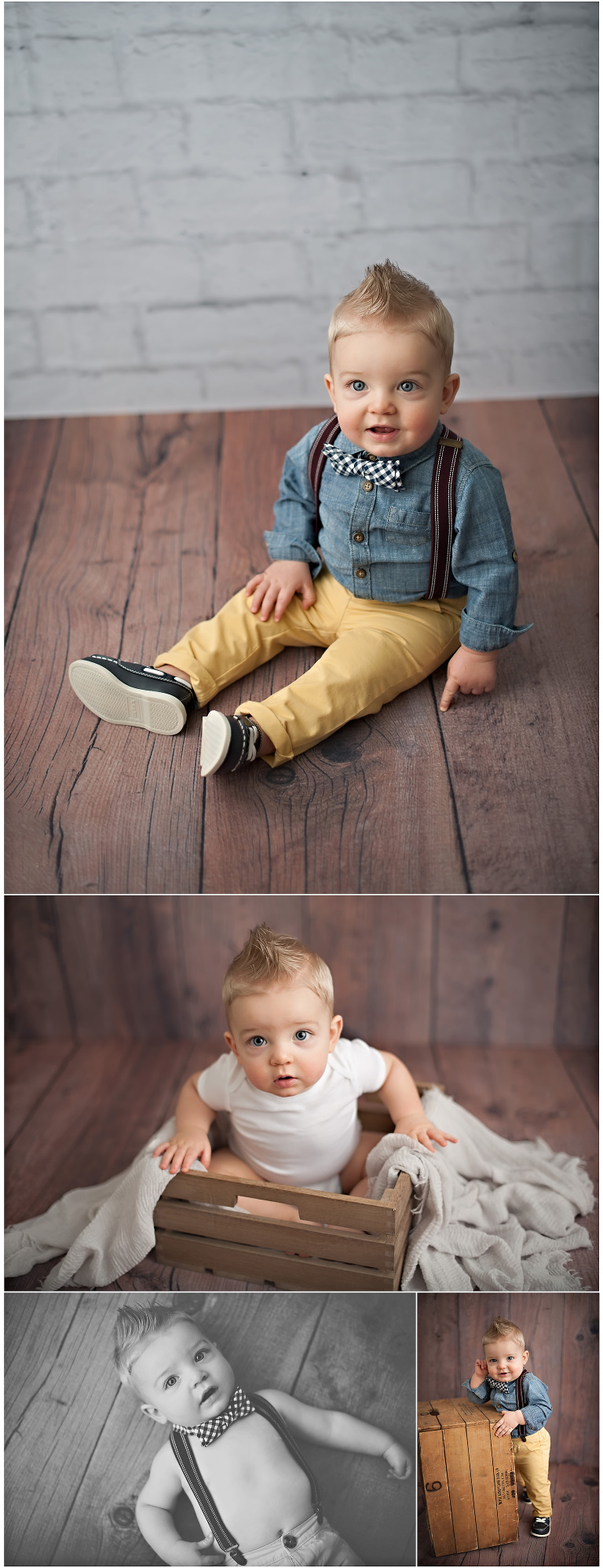 One year old baby boy in suspenders on wood floor with white brick backdrop