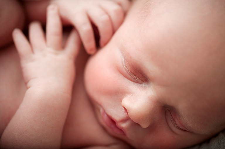 Newborn twin macro shot of face