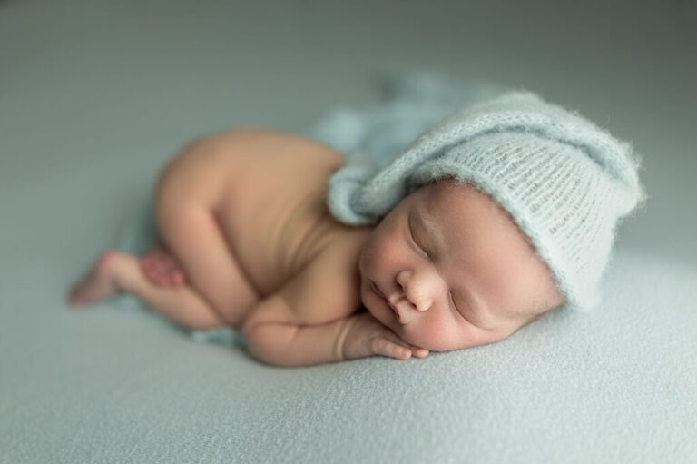 sleeping newborn baby side pose professional newborn photography Utah