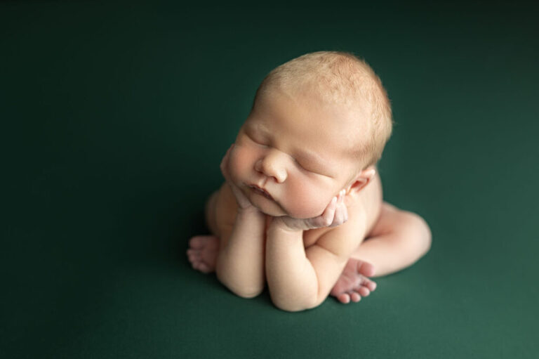 newborn baby groggy pose professional newborn photographer Utah